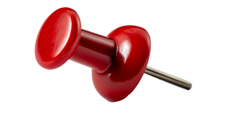 A close-up view of a vibrant red thumbtack isolated against a solid black background