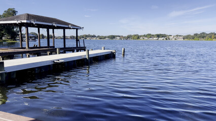 Lake Roy boat dock wavy water clear blue sky