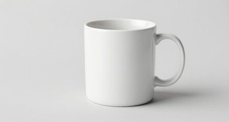 Fototapeta premium High-quality white coffee mug isolated on light gray backdrop, subtle shadow, advertising space featuring a professional and clean aesthetic, perfect for creative projects, advertising, a...