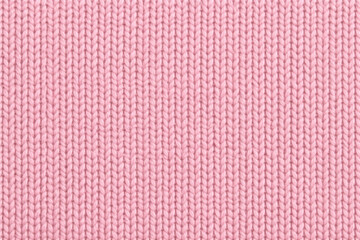 Seamless pink knitted fabric texture background