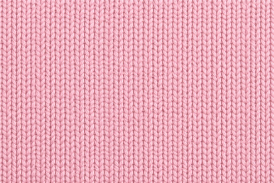 Seamless pink knitted fabric texture background