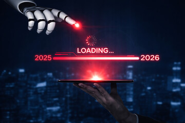 Robot hand and human hand interacting with a 2025 to 2026 loading bar on a digital tablet represents artificial intelligence integration and technological progress
