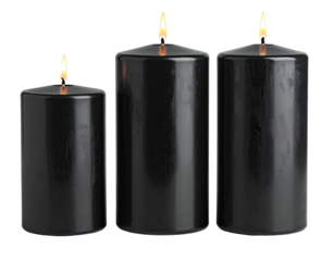 Three black lit pillar candles, different heights, against a dark background