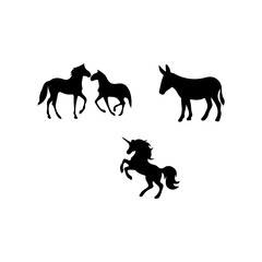Black silhouettes of horses donkey and unicorn on white background