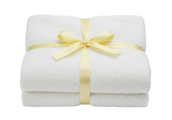 Stack of soft white towels tied with yellow ribbon isolated on transparent background, spa and bathroom textile for hygiene and comfort