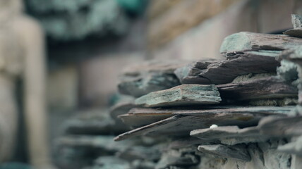 Detailed Close-up of Stacked Natural Stones with Worn Texture and Earthy Tones