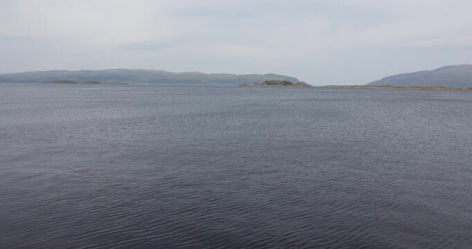 Wide shot of the Sound of Jura with Islands of Reisa Mhic Phaidean, coiresa, and Scarba in background
