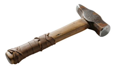 Close-up shot of a well-used hammer with a wooden handle and metal head.