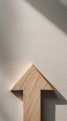 Paper house arrow on beige wall, real estate price growth concept