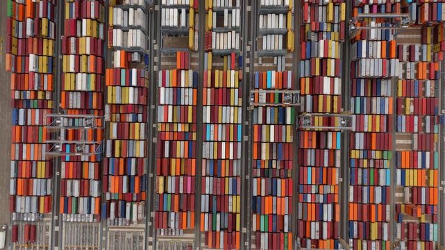 Drone Footage From Above of Large Cargo Ship at Busy Thames Port London Supporting Global Transport and Shipping Economy