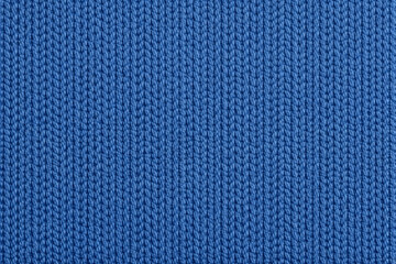Seamless blue knitted fabric texture background