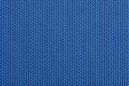 Seamless blue knitted fabric texture background