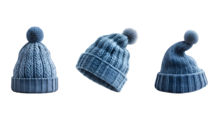 Three blue knit beanies with pom poms on transparent background