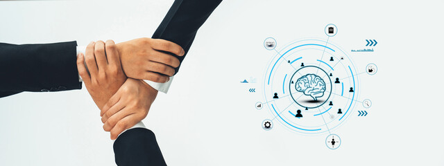 Image showcases diverse hands coming together in a collaborative gesture, emphasizing teamwork and partnership in a modern digital landscape, symbolizing unity and innovation. Trope