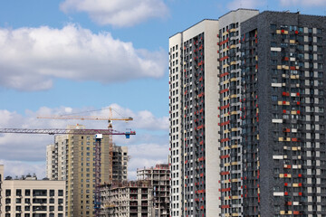A Construction Site In A City District With Tower Cranes And Modern Skyscrapers Under Development. Concept Of Urban Growth.