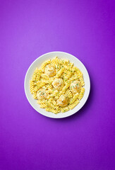 Pasta with chicken meatballs in a creamy sauce. Italian cuisine. Recipe.