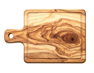 Top view of a wooden cutting board with a handle and groove on a black backdrop