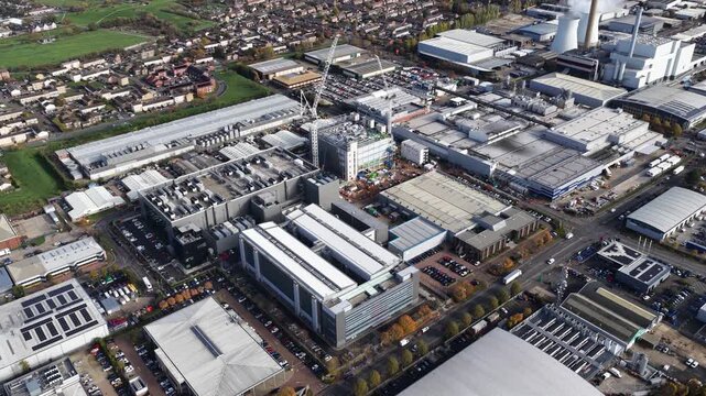 Aerial video of a modern data center in Slough, United Kingdom, computing infrastructure, storage servers, digital systems that process and large volumes of data for cloud and enterprise services.
