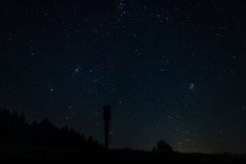 water tower and night sky