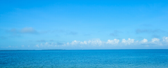 Beach and blue sky for summer background