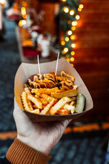 Currywurst and Fries in a Paper Tray at a European Street Food Market
