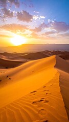 Golden dunes under the sunset with clouds