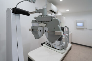 Modern Phoropter in a Bright, Clean Eye Examination Room Ready for Vision Testing