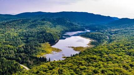 Aerial View from Mount Belanger, Quebec, Canada of Serpentine Lake in a Lush Mountain Forest