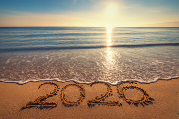 Happy New Year 2026 concept, lettering on the beach. Written text on the sea beach at sunrise.