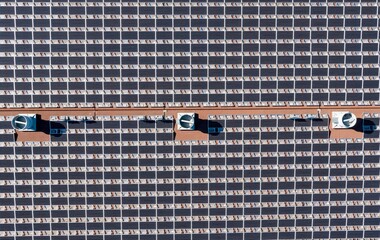 Aerial View of a Large Solar Panel Array on a Sunny Day