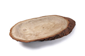 Wooden oval plate made from a tree cut isolated on a white background.