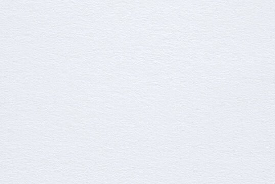 A sheet of white watercolor paper texture as background