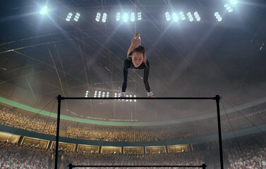 A gymnast performs a difficult trick on a horizontal bar.