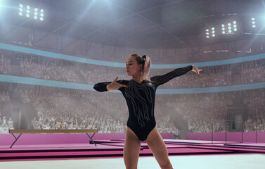 Female gymnast on professional gymnasts arena.