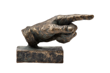 Small antique style bronze pointer hand sculpture on a short rectangular base, index finger pointing right with engraved knuckle details and aged patina isolated on transparent background.
