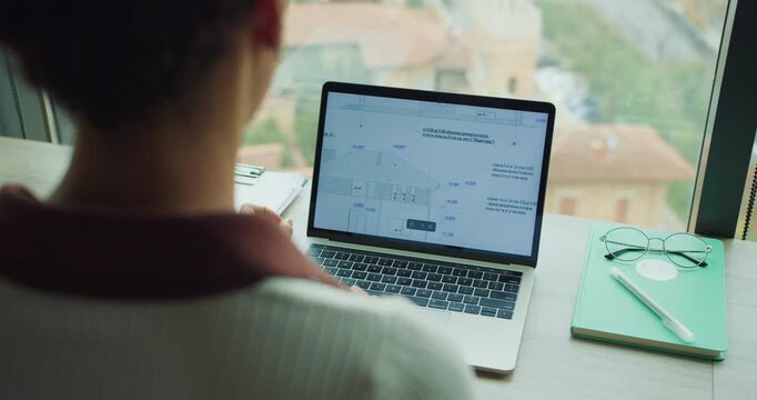 Scientist observes analytical statistics from high area