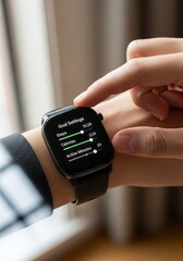Fototapeta premium Person Setting Fitness Goals on Smartwatch Interface Close Up