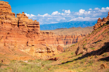 Fototapeta premium Charyn Canyon, Valley of Castles. The excellence of Kazakhstan. Panorama of natural unusual landscape. The red canyon of extraordinary beauty looks like a Martian landscape.