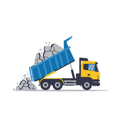 dynamic construction truck unloading debris in industrial site during daytime