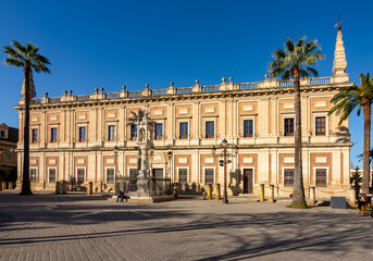 Obraz premium Archive of Indies (Archivo General de Indias) on Triumph square in Seville, Spain