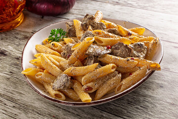 Italian pasta penne with chicken liver