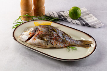 Baked dorada fish with spices