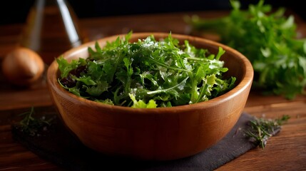A close up view of a fresh mixed green salad in a rustic wooden bowl garnished with cheese and served on a wooden table