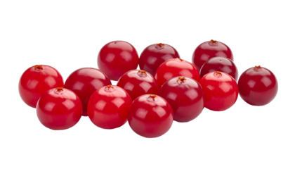 A close-up shot of a group of vibrant, round, red berries arranged on a stark black background, showcasing their smooth texture