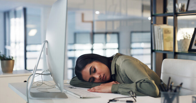Tired, woman and sleeping at computer in office for editing burnout, article fatigue or low energy. Tech, journalist and exhausted at publishing agency for journalism workload, overworked and resting