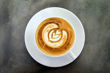 a cup of latte art coffee for background