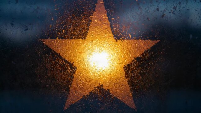 Shimmering five-point star cutout and droplets catching flickering lamp glow at dusk, lamp behind