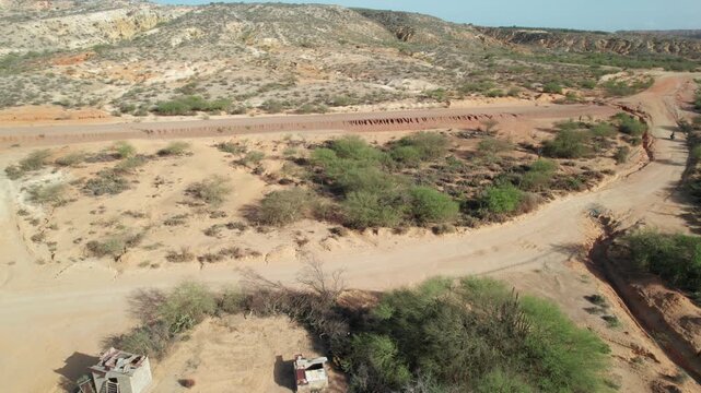 Aerial view of desert road in Tierra de Araya, serene landscape