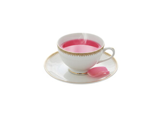 A teacup brimming with pink liquid

