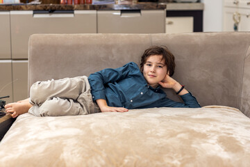 Portrait of a boy relaxing on the couch